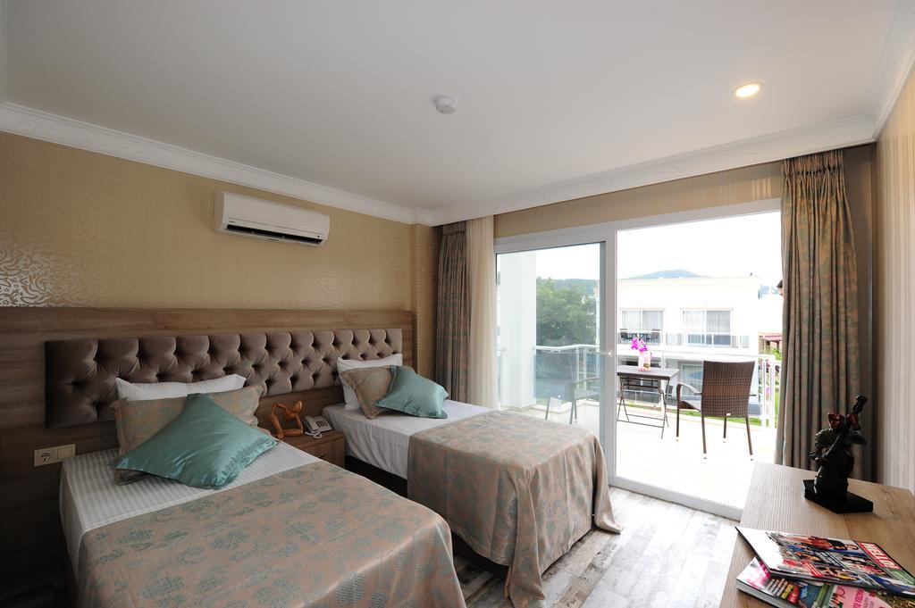 Delita Suite Hotel Turkbuku Golturkbuku Quarto foto